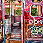 Vibrant Graffiti on Abandoned Bus Poster
