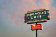 Magnolia Cafe Neon Sign at Sunset Art Print by Slow Fuse Photography