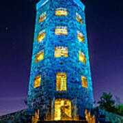 Illuminated Stone Tower at Night Art Print