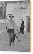 Woman Walking on a Sunny Street Wood Print