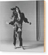 Raquel Welch in Dance Pose Wood Print by Bert Stern