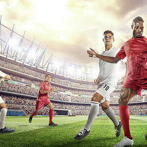Soccer Player Kicking Ball In Stadium #3 by Dmytro Aksonov