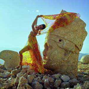 A Model Wearing A Pauline Trigere Dress And Scarf by Henry Clarke A Model Wearing A Pauline Trigere Dress And Scarf by Henry Clarke