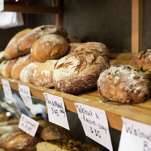 Artisan Bread On Shelves In Bakery by Betsie Van Der Meer