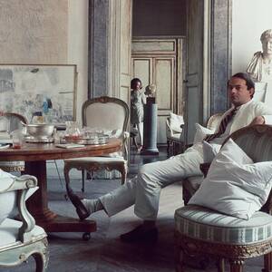 Cy Twombly Sitting In His Apartment by Horst P. Horst