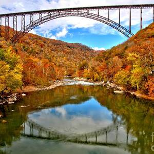Flaming Fall Foliage At New River Gorge by Adam Jewell