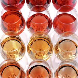 Glasses Of Rose Wine by Romulo Yanes