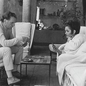 Richard Burton And Elizabeth Taylor Playing Gin by Henry Clarke