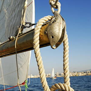 Rope on sailboat mast during navigation by Sami Sarkis Photography