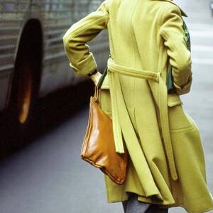 Shelley Smith Wearing A Camel Coat by Arthur Elgort