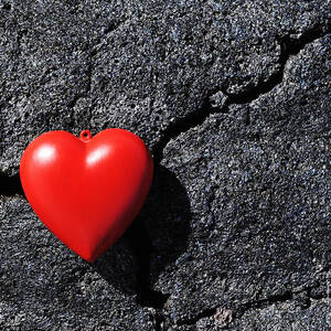 Heartshape on cold black lava by Sami Sarkis Photography