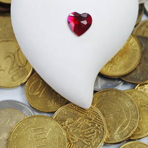 Heartshape on money by Sami Sarkis Photography