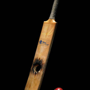Cricket Bat With Hole And Ball by Phil Ashley