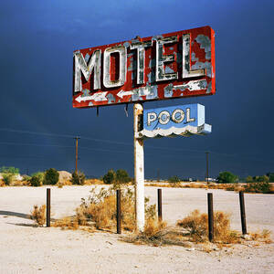 Derelict Motel Sign In The Desert by Gary Yeowell