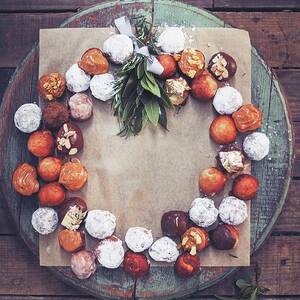 Doughnut Balls With Different Glazes Arranged In A Wreath by Great Stock!