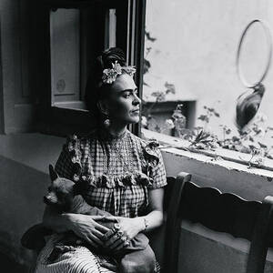 Frida Kahlo Holding Her Dog by Bettmann