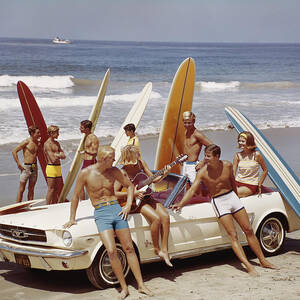 Friends Having Fun On Beach by Tom Kelley Archive