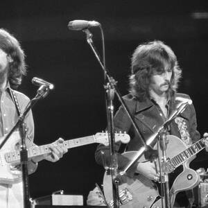 George Harrison And Eric Clapton by Bettmann