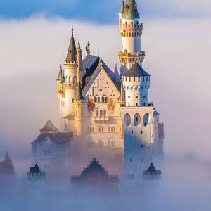 Germany, Bavaria, Swabia, Neuschwanstein Castle In The Fog by Olimpio Fantuz Germany, Bavaria, Swabia, Neuschwanstein Castle In The Fog by Olimpio Fantuz