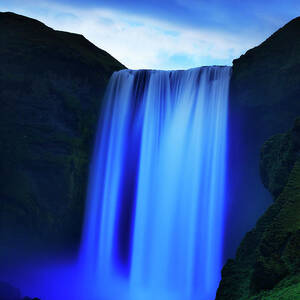 Iceland, South Iceland, Skogafoss Waterfall At Night by Maurizio Rellini