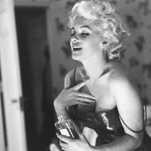 Marilyn Monroe With Chanel No. 5 by Michael Ochs Archives