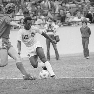 Pele And Neil Cohen During Soccer Game by Bettmann