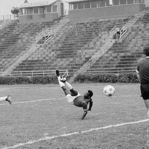 Pele Performing Tricky Soccer Maneuver by Bettmann