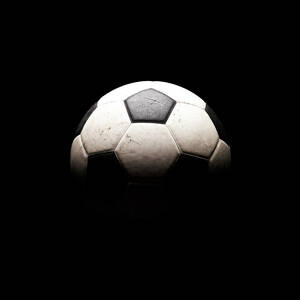 Soccer Ball In Shadows by Thomas Northcut