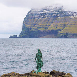 Statue of Selkie or Seal Wife in Mikladalur, Faroe Islands by Miroslav Liska