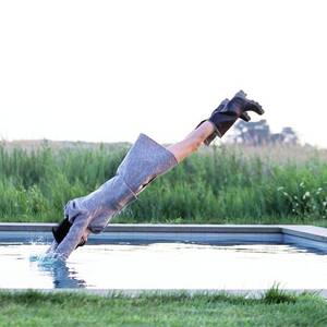 Stella Tennant Diving Into A Pool by Arthur Elgort
