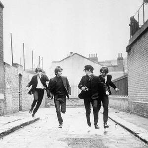 The Beatles Running In A Hard Days Night by Bettmann The Beatles Running In A Hard Days Night by Bettmann