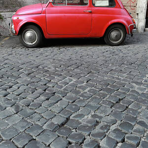 Tiny Red Vintage Car In Rome, Italy by Romaoslo Tiny Red Vintage Car In Rome, Italy by Romaoslo