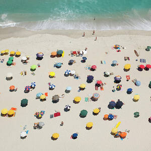 Umbrella Pattern On Beach by Roger Wright