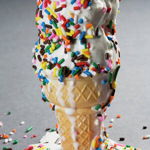 Vanilla Ice Cream Cones With Sprinkles by Henry Horenstein