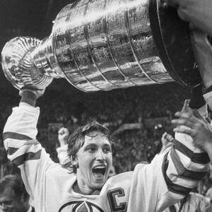 Wayne Gretzky Lifts The Stanley Cup by Bettmann
