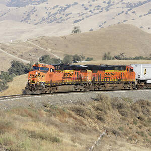 Hotshot -- BNSF ES44AC and ES44C4 Pulling an Intermodal Train in the Tehachapi Mountains, California by Darin Volpe Hotshot -- BNSF ES44AC and ES44C4 Pulling an Intermodal Train in the Tehachapi Mountains, California by Darin Volpe
