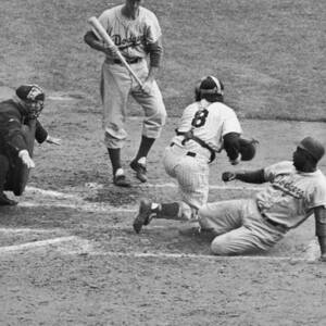 Jackie Robinson and Yogi Berra by Hulton Archive