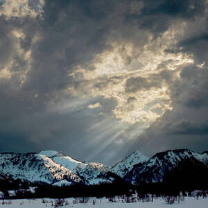 Mountain Veil  Clearing Storm Over Snow-Covered Peaks by Robert Niemeier