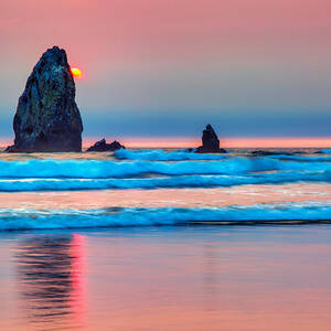 The needles rock formation at cannon beach at sunset by Bruce Block