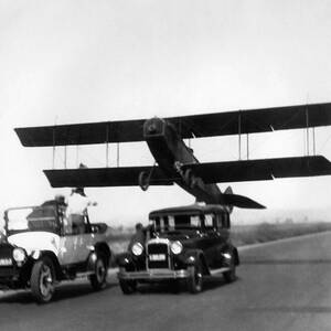 Vintage Aviation Stunt Show Biplane Retro Classic Cars Deserted Road History Daredevil by Silver Screen