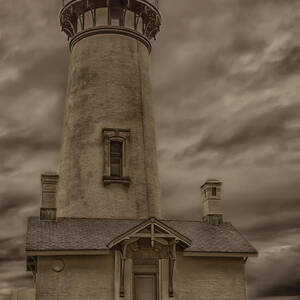 Yaquina Light - Historic Newport Oregon Lighthouse under a dramatic sky by Mike Lee