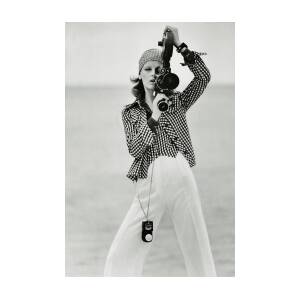 A Model Looking Through A Beaulieu Camera Wearing by Gianni Penati A Model Looking Through A Beaulieu Camera Wearing by Gianni Penati