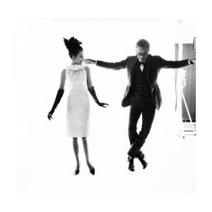 Actor Peter O'Toole Dancing With A Model by Bert Stern
