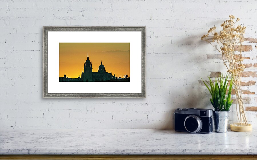 Salamanca Cathedral at sunrise in silhouette, as a framed print on a wall